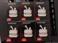 Six boxed True Wireless Stereo Bluetooth earbuds showing front packaging with product image and Bluetooth 5.0 feature.