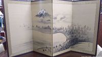 Front view of the four-panel Japanese folding screen showing Mount Fuji and misty forest hand-painted on silk.