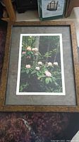 Framed photo print of Pacific Rhododendron flowers and forest background, showing full front view with a wood and gold ornate frame and charcoal grey matting.
