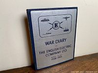 Front cover of the hardcover book titled 'War Diary of The English Electric Company Ltd 1938-1945' showing military icons and company logo.