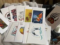 15 First Nations art cards laid out showing a variety of designs including birds, people, and abstract patterns, cards are blank 4x6 size.
