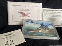 WWII Unique Obsolete Coin Set displayed with original envelope and Certificate of Authenticity from The American Historic Society.