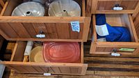 Drawer with additional baking accessories including rectangular plastic container and other baking items