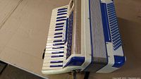 Top-down view showing keyboard, grille, bellows