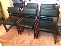 Front angled view of all six chairs showing seats, backrests, and frames.