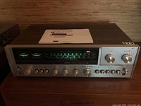 Front view with power on, green tuning dial illuminated