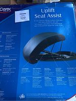 Packaging box with product name Carex Uplift Seat Assist and product image detailing features and specifications.