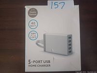 Front image of the product box showing 5-port USB home charger with power and cable length specifications