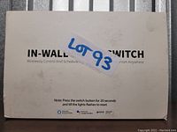 Closed box of in-wall smart light switches labeled Lot 93