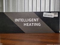 Closed box with Intelligent Heating branding on top.