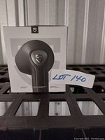 Photo of retail box for Soundpeats wireless earbuds showing front packaging with logo and branding.