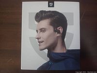 Front of box with image of person wearing Soundpeats S5 Sport earbuds, showcasing product use for sports and active lifestyle.