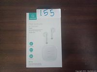 Box of USAMS True Wireless IA Series earbuds showing packaging front with branding and product features.