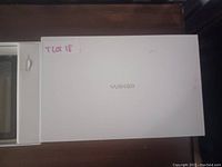 White packaging box with Yumkem branding on the cover.