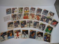 Overview of 30 hockey cards from the 1978-79 season spread out to show front sides, all in sleeves for protection.