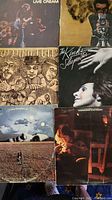 Top view showing 8 vinyl LP album covers including Live Cream, The Kinks Sleepwalker, Golden Lightfoot, and others.