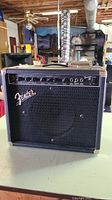 Front view of Fender Frontman 25A amplifier showing speaker grille and Fender logo