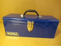 Front view of blue metal toolbox with RONA logo and handle
