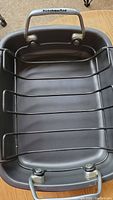 Top-down photo of KitchenAid roasting pan showing the inside and removable metal rack.