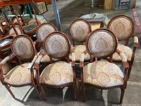Six matching upholstered wooden frame chairs by Shafer Commercial Seating, arranged in two rows showing front and side views.