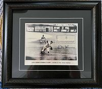 Frontal view of framed signed photo