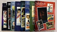 Photo showing all 10 Heritage Auctions vintage movie poster catalogues with full-color covers, arranged fan style.