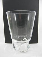 Front view of clear Steuben vase with trefoil base