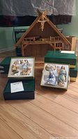 Overall set with wooden stable and porcelain figurine boxes