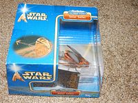 Front view of boxed Star Wars Micro Machines Action Fleet Solar Sailer miniature vehicle in original blue packaging.