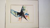 Full view of framed signed watercolor painting by Priscilla Flynn, showing abstract subject primarily in blue, black, with accents of red and yellow.