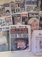 Overall view of multiple British newspapers featuring Princess Diana and royal family on front pages