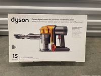 Front of original packaging showing Dyson digital motor for handheld suction, model DC43H, and product image.