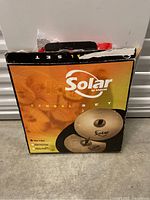 Box packaging for Solar by Sabian cymbal set, showing branding and product image.