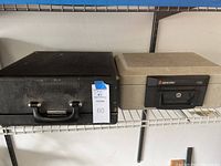 Side view of the black textured case for Smith Corona typewriter and adjacent Sentry firebox safe on shelf