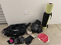 Full lot showing all items including gym bag, boxing gloves, workout gloves, weightlifting gloves, cinch belt, yoga mat, and swim caps.