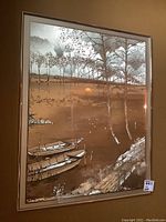 Silvered art print landscape showing boats on a shore with trees and sunset with silver leaf reflective details, framed and matted
