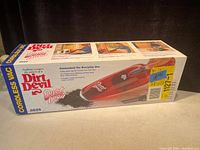 Boxed Dirt Devil cordless handheld vacuum model 0825 with label and marketing text