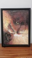 Framed original oil painting on canvas with abstract textured design in warm colors, 12x16 inches.