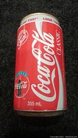 Full view of vintage Coca-Cola Classic full can showing classic red white logo, original taste and 355 mL volume.