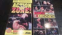 Front cover of WWF Action Zone VHS tape showing Undertaker wrestling Vader.