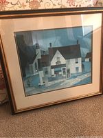 Full view of framed A.J. Casson print titled 'Country Store' showing a white country store building with surrounding fence and ground with birds.