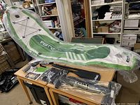 Board and all accessories laid out on table