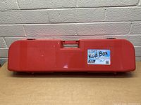 Front view of a bright red MTM Case Gard fishing rod case with label 'Rod Box'.