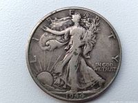 Obverse side of the 1944 Walking Liberty half dollar coin showing the Liberty figure with inscriptions and date.