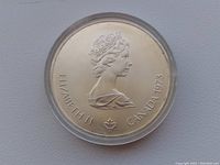 Obverse side of the coin showing the profile of Queen Elizabeth II with the year 1973 and Canada inscription.