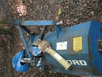 Side view showing 3-point hitch frame, PTO driveline connection and gearbox