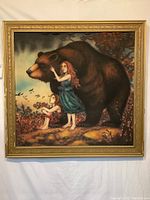Full view of framed art piece showing two children with bear