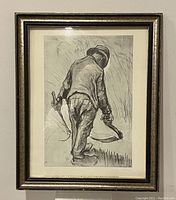 Framed lithograph showing the full image of Van Gogh's Peasant Reaping Corn sketch with the figure reaping corn walking away from view.