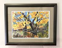 Full view of the framed watercolour painting featuring autumn trees and wooden fence.