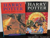 Front covers of 'Harry Potter and the Goblet of Fire' and 'Harry Potter and the Deathly Hallows' hardcover books showing colorful illustrations and titles.
